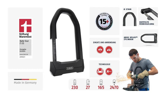 BUS Granit Super Extreme 2500 Bügelschloss mit Stiftung Warentest Testsieger-Siegel (1,2), Security Level 15+, 27mm Bügel, XPlus Zylinder und Mann der versucht es mit einer Flex zu öffnen.